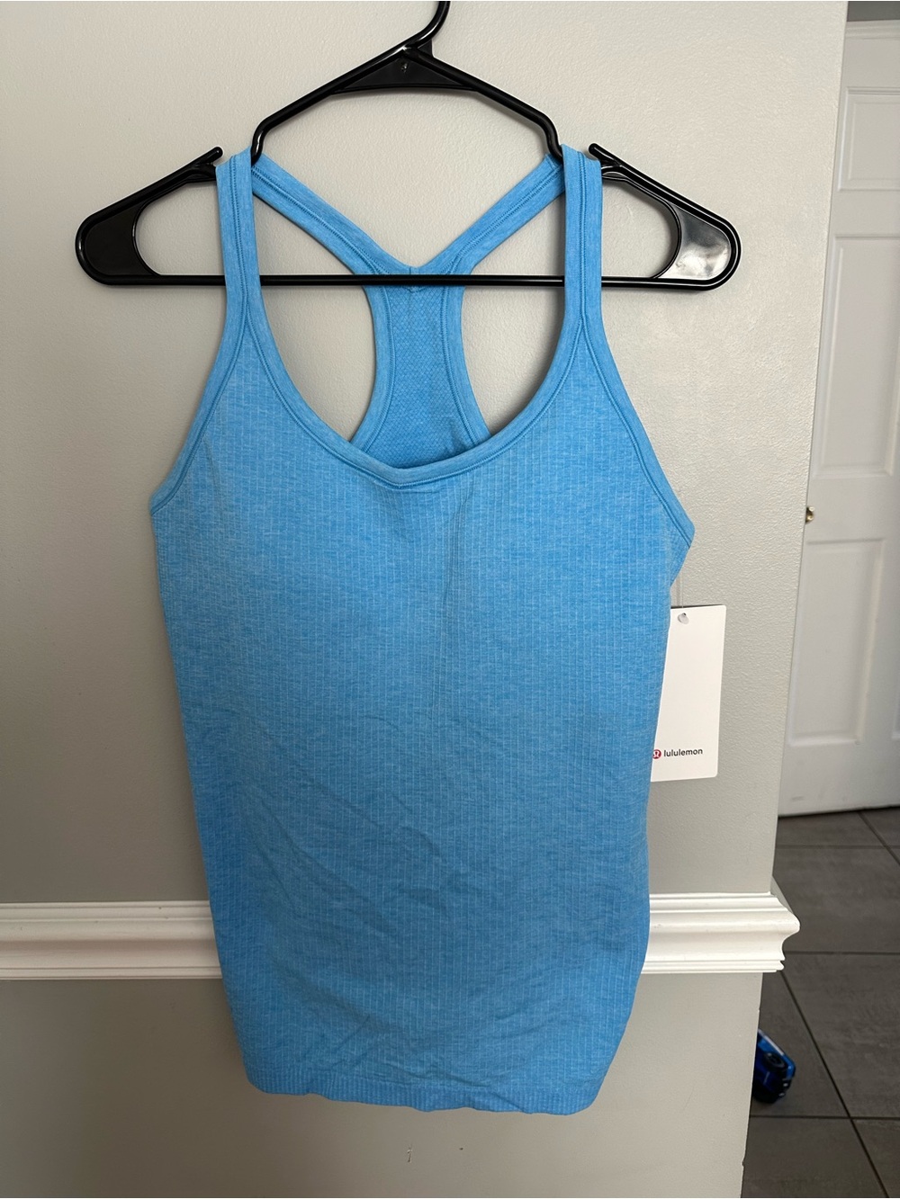 Lululemon Ebb to Street Tank - Blue
SIZE 10